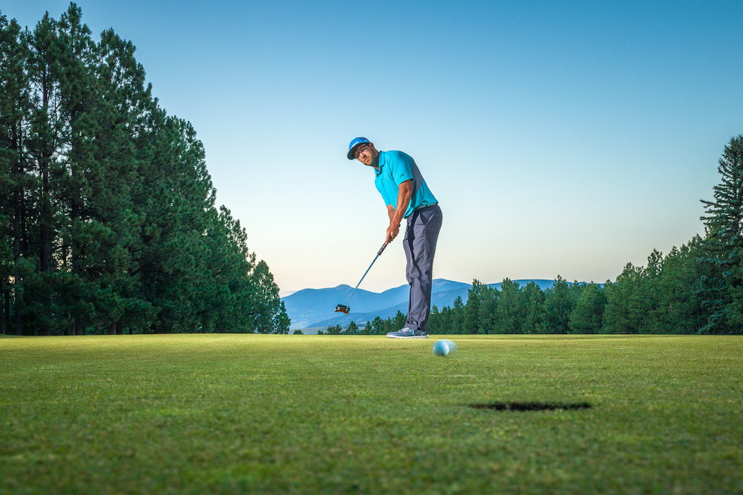 Evan playing golf at the Angel Fire Resort in Angel Fire, New Mexico.