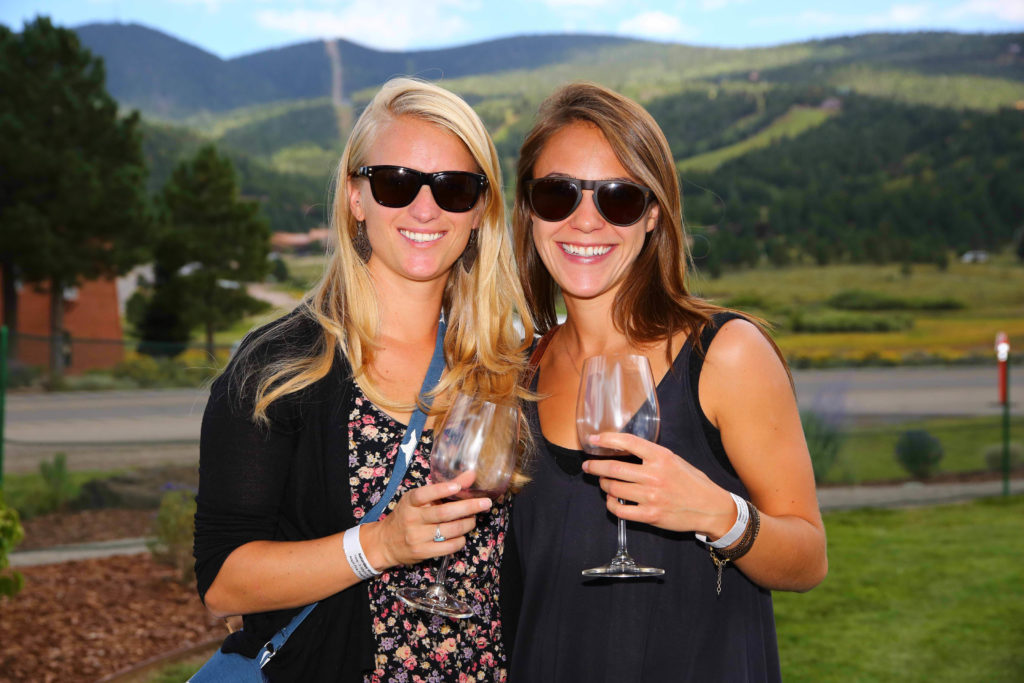 Two ladies enjoy wine at the Wine and Wagyu weekend